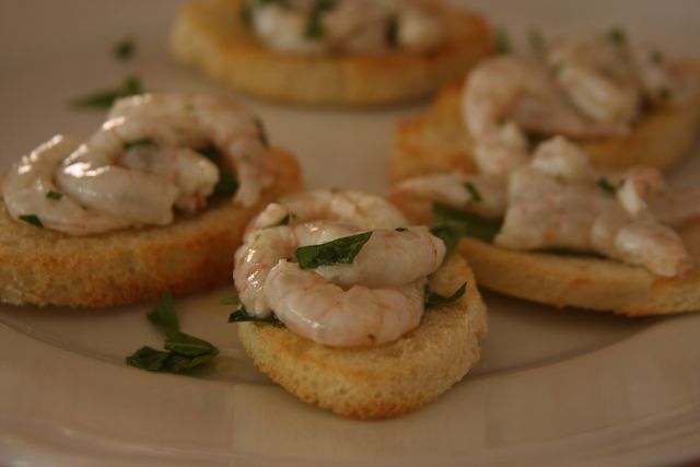Shrimp and herbs on crostini. Simple and delightful.